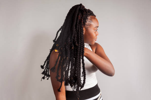 istock Touching  braided hair 1944756258