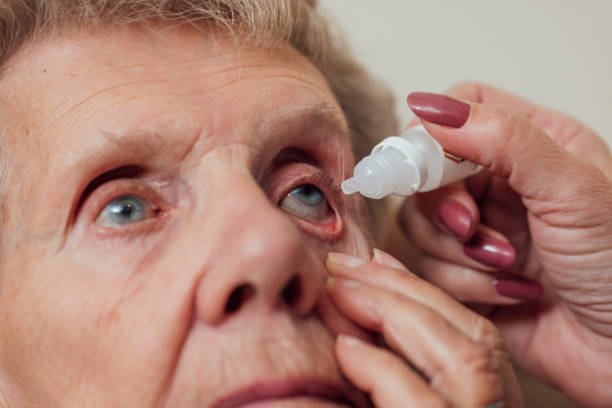 istock Applying Medical Eyedrops 1944764933