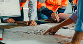 closeup-of-team-of-industrial-engineers-