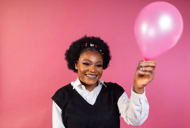 istock Joyful Moments: Fashionable Portrait with Balloon 1944773827