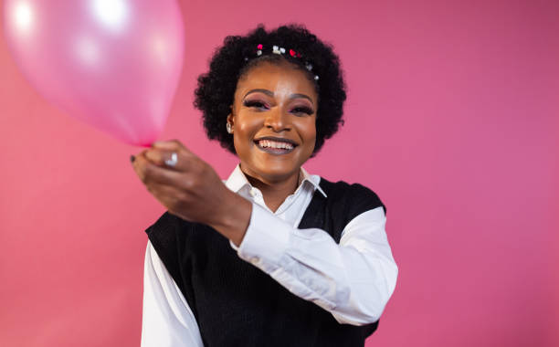 istock Joyful Moments: Fashionable Portrait with Balloon 1944774367