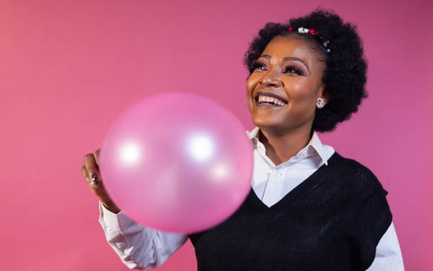 istock Joyful Moments: Fashionable Portrait with Balloon 1944774933