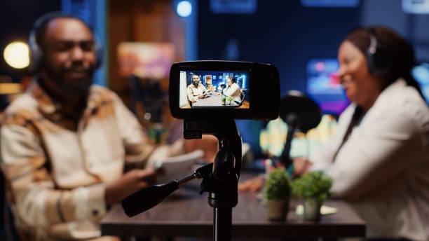 istock Focus on professional camera used to record radio show 1944802963