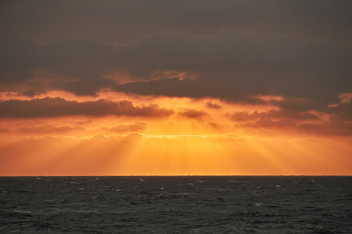 Dramatic sunbeams over the Pacific Ocean.
