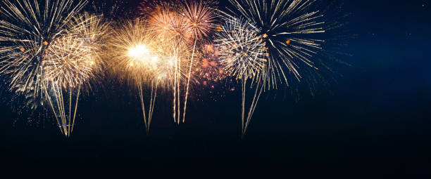 istock Amazing golden fireworks exploding in the starry night sky, concept. Holidays and New Year 2024, creative idea. Creative celebration. Christmas card 1944809298