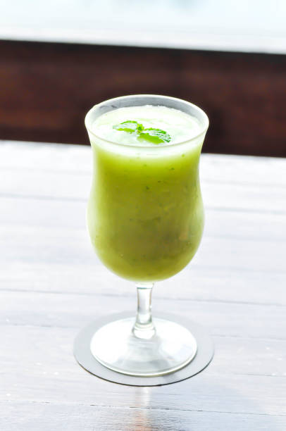 fruit juice or apple juice , apple smoothie or fruit smoothie or green apple smoothie