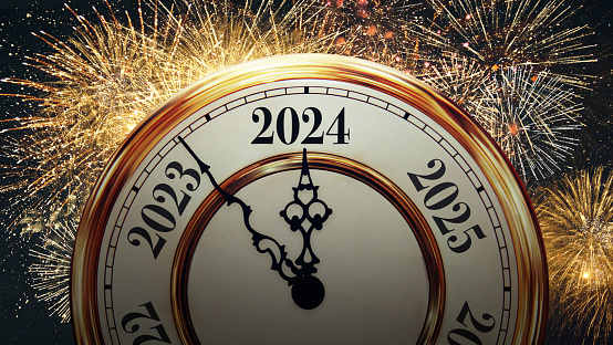Beautiful vintage clock points to the new year 2024 with golden fireworks, concept. Happy new year 2024, creative idea. Celebration card. Christmas Eve night