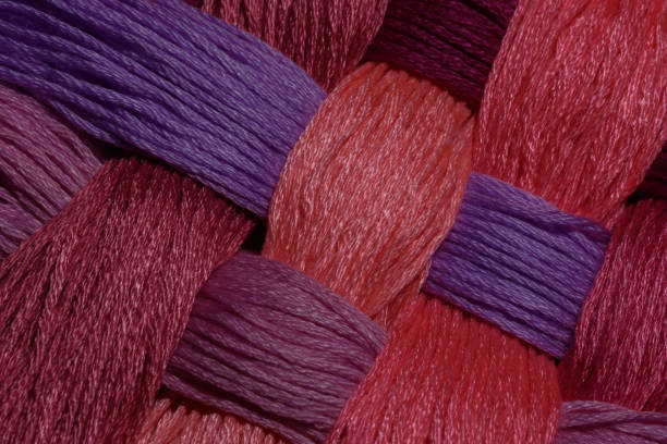 Colorful cotton threads arranged one next to the other