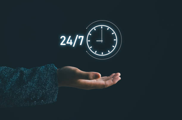 istock Customer service. nonstop service concept. businessman hand holding virtual 24-7 with clock on hand for worldwide nonstop and full-time available contact of service concept. 1944843333