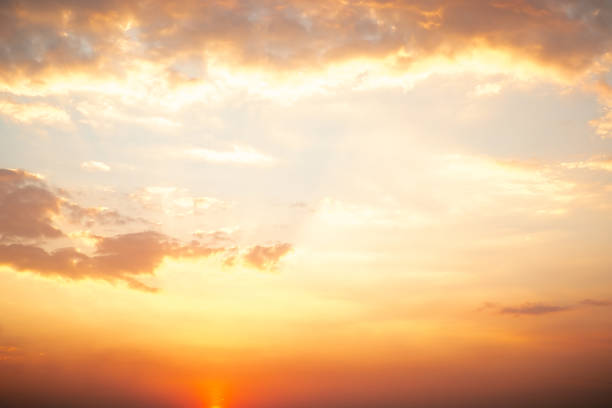 Beautiful , luxury soft gradient orange gold clouds and sunlight on the blue sky perfect for the background, take in everning,Twilight, Large size, high definition landscape photo