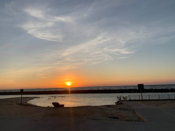 istock The sunset view with the sea beach in the evening time 1944859301