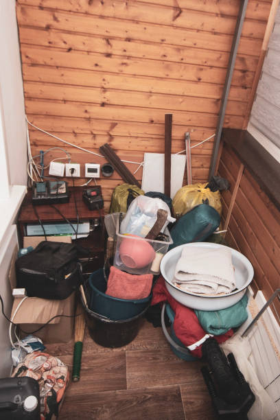 istock trash and disorder of unnecessary things from the storage area in a container located on the balcony and loggia of the apartment 1944896157