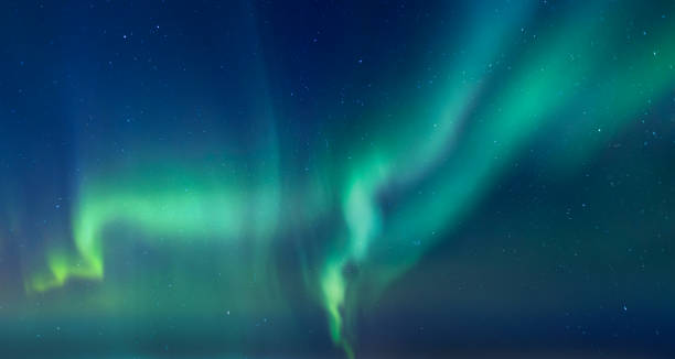 istock Northern lights or Aurora borealis in the sky - Tromso, Norway 1944899295