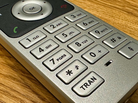 A close-up photograph of a handheld phone