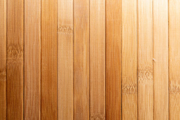 istock Background made of vertical yellow bamboo laths.texture, background of brown bamboo. 1944969331