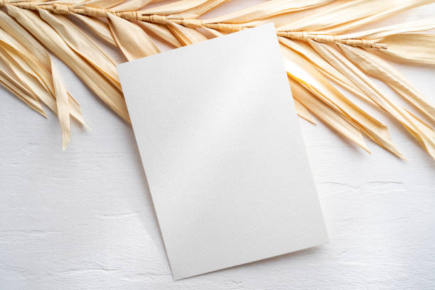 istock Empty 5x7 card mockup on white wood background 1944980830