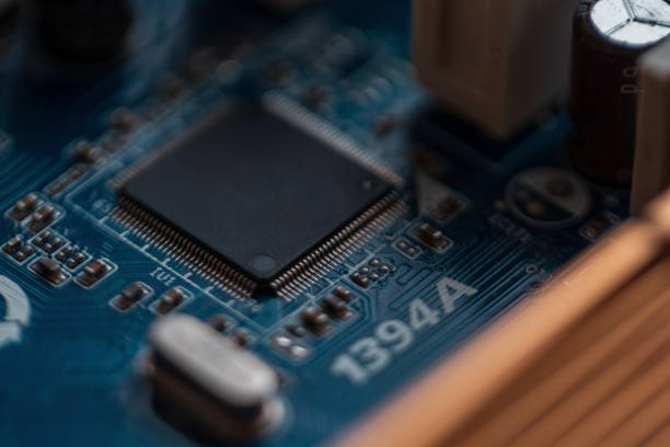 Computer chip on motherboard with transistors, close-up. AI and hardware