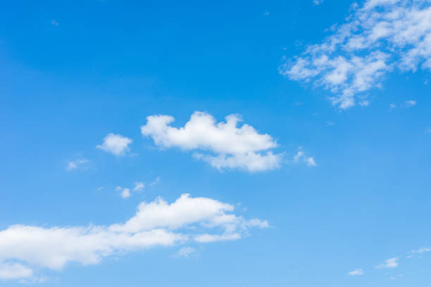 istock Blue sky white cloud scene.beautiful sparse clouds in the blue sky.White clouds in blue sky. 1944998334