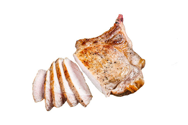 istock Grilled and sliced tomahawk pork chop meat steak  Isolated on white background, Top view. 1945035944