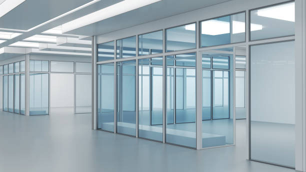 istock Shopping mall store facades with glass storefronts 1945040252