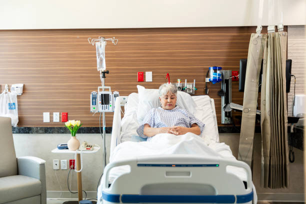 istock Alone for a moment, senior female patient prays 1945089029