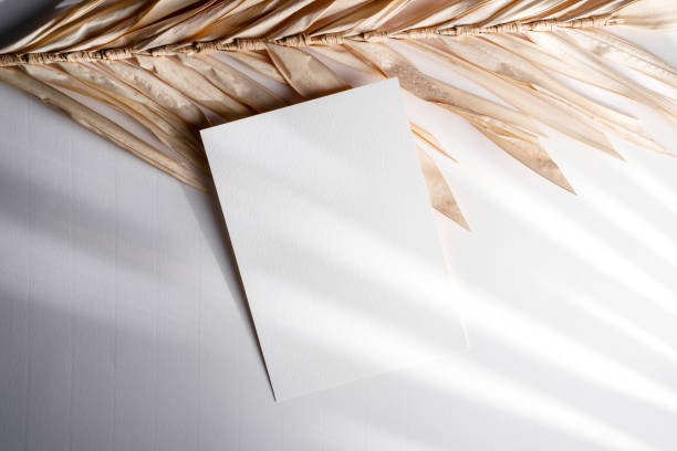 istock Empty 5x7 card mockup on white wood background 1945090104