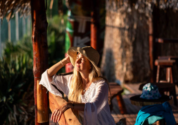 istock a woman poses at sunset 1945109322