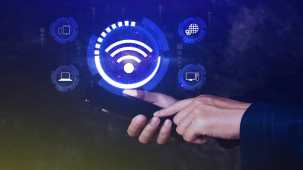istock Businessman using smartphone with wifi icon. Social network business communication concept, Wifi wireless concept free network Internet concept. 1945122032