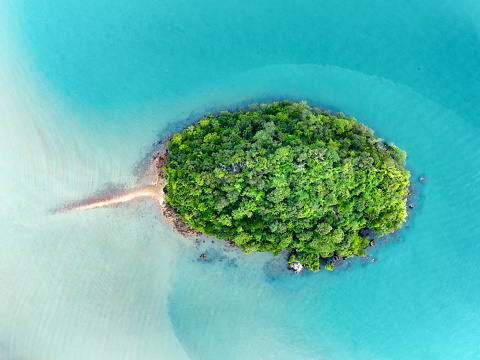 View from above, stunning aerial view of a small island bathed by a turquoise water. Ao nang, Krabi, Thailand.