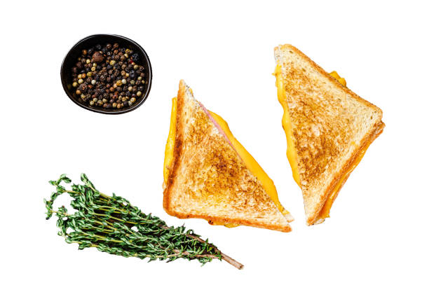 istock Fried ham and melted cheese sandwich.  Isolated on white background, Top view. 1945128316