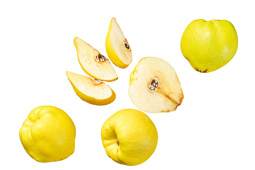 Cut yellow quince fruits  Isolated on white background, Top view