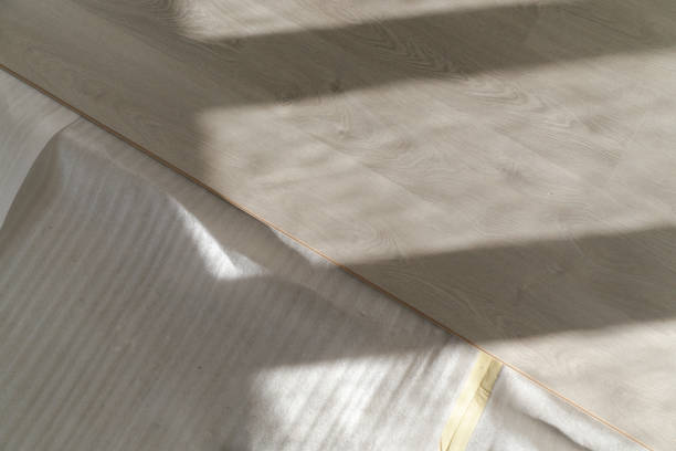 istock Laminate vinyl floor, home improvement, new floor installation 1945148744