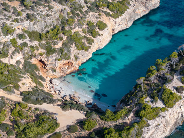 istock Drone view Calo des Moro and s'Almunia 1945214527