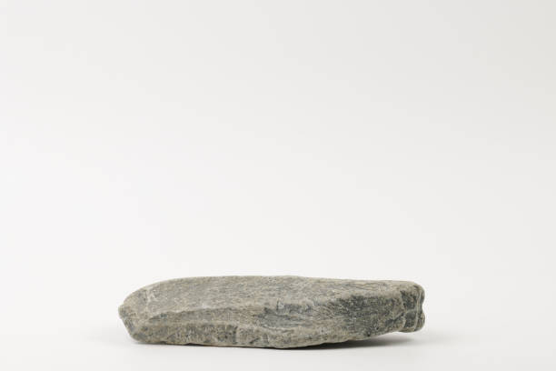 Gray flat textured stone pedestal on white background, template for mock-up, banner. Minimal concept, empty podium display product, presentation scene