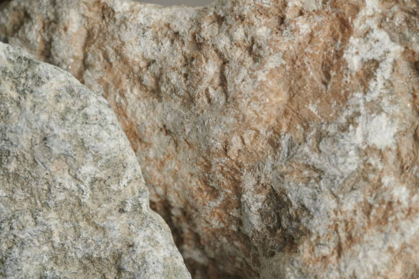 istock Stone texture abstract background. Close up natural mineral rock backdrop 1945289247