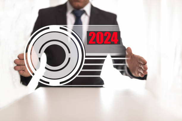 istock Businessman showing a new year goals concept on a touch screen interface ,2024 1945302413