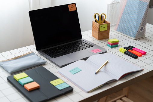 A laptop computer placed on a desk.