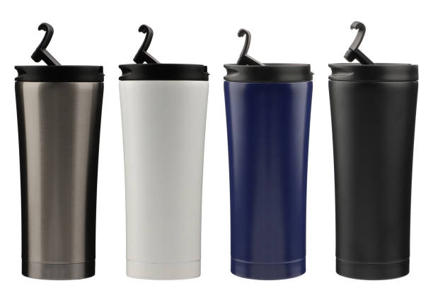 istock Thermos collection, top view, isolated background. Thermoses in different colors and similiar shapes. Coffee and tea thermos. 1945369894