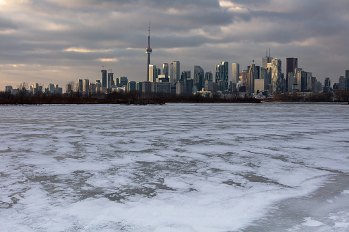 Toronto skyline at dusk from frozen Lake Ontario