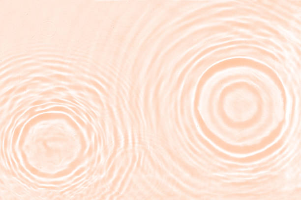 istock Abstract water texture, surface with drops, rings and ripple 1945438160