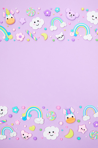 Trendy pastel purple kawaii banner background design template with cute air plasticine handmade cartoon animals, unicorns, stars, rainbows pattern. Top view, flat lay, copy space. Candycore, fairycore