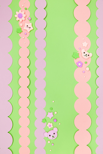 Trendy pastel green kawaii banner background design template with cute air plasticine handmade cartoon animals, flowers, stars pattern. Top view, flat lay, copy space. Candycore, fairycore