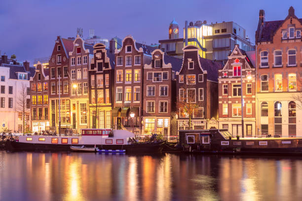istock Amsterdam canal Amstel with dutch houses 1945501099
