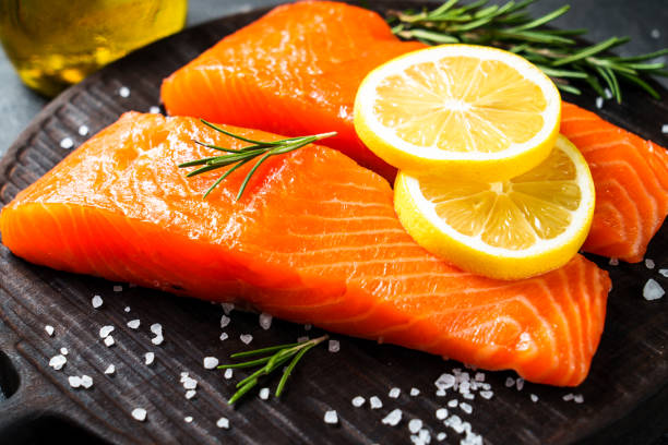 istock Salmon fillet with lemon and spices. 1945537874