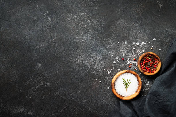 istock Spices and herbs at black top view. 1945542077