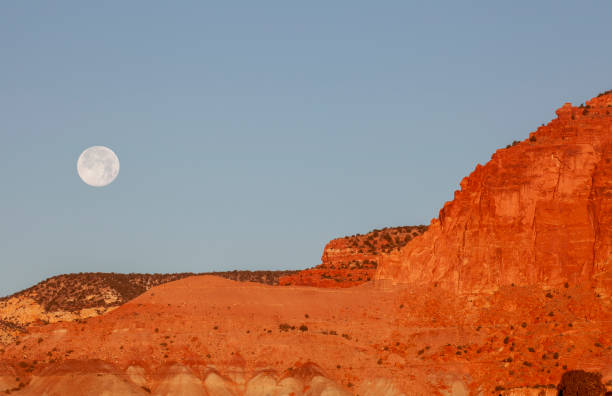 istock Full Moon Setting Over Capitol Reef National Park 1945562658