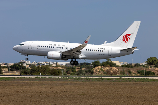 Luqa, Malta - September 16, 2023: Beijing Airlines Boeing 737-79L BBJ (REG: B-3999) landing runway 31.