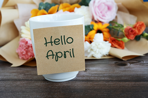 Hello April on adhesive note stick on coffee cup