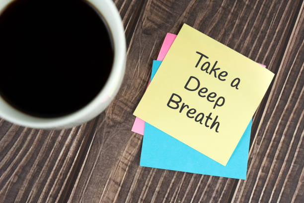 Take a deep breath text on adhesive note