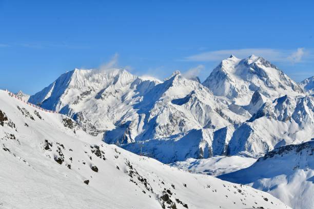 Snowcapped mountains by winter